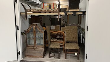 Thermo Lignum® WARMAIR Kammer mit Mobiliar aus dem Museumsbestand